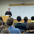 Riley Mangan starting his talk